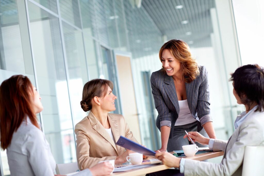 Four women in a meeting at work.